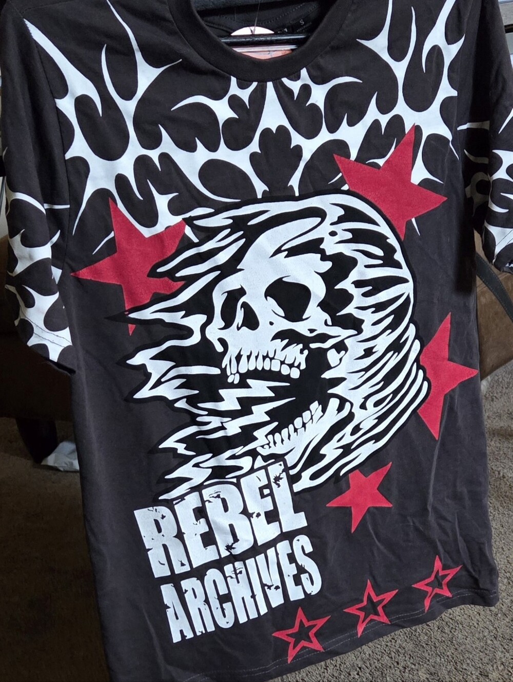 Rebel Vengeance Black Tee with White Skull Pattern